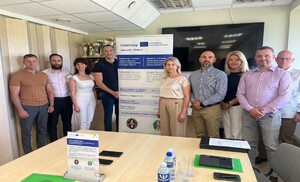 IV spotkanie Na zdjęciu znajdują się uczestnicy spotkania na tle banneru INTERREG